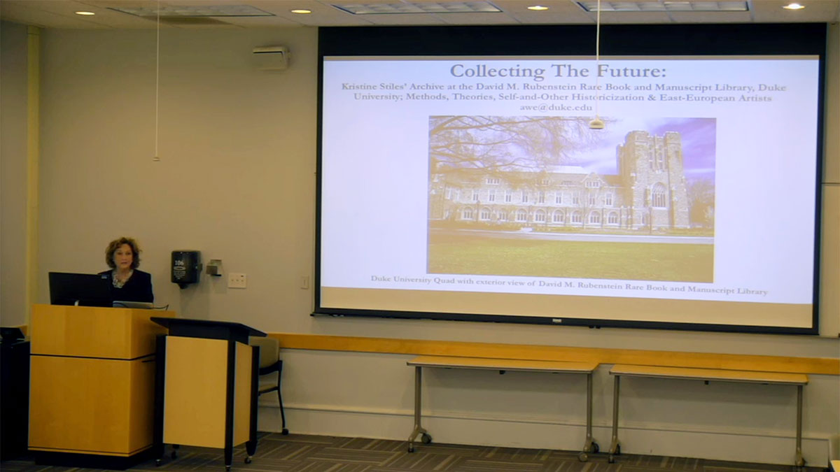 Snapshot from video recording of lecture by Kristine Stiles
